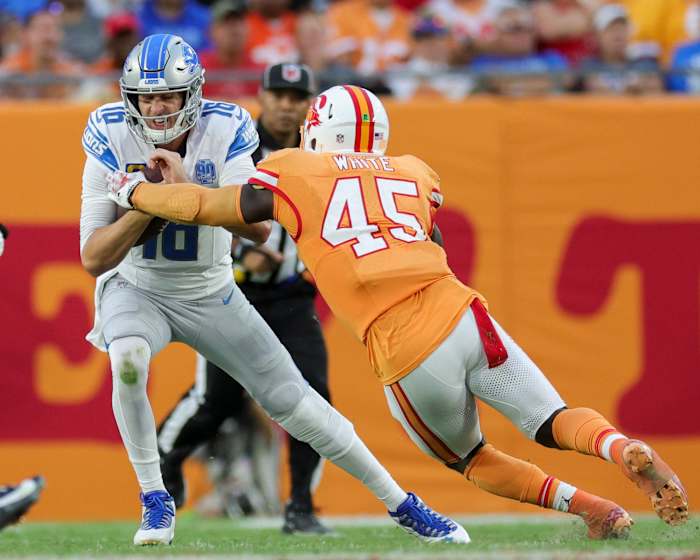 Detroit Lions quarterback Jared Goff (16) is tackled by Tampa Bay Buccaneers linebacker Devin White (45) in the third quarter at Raymond James Stadium.